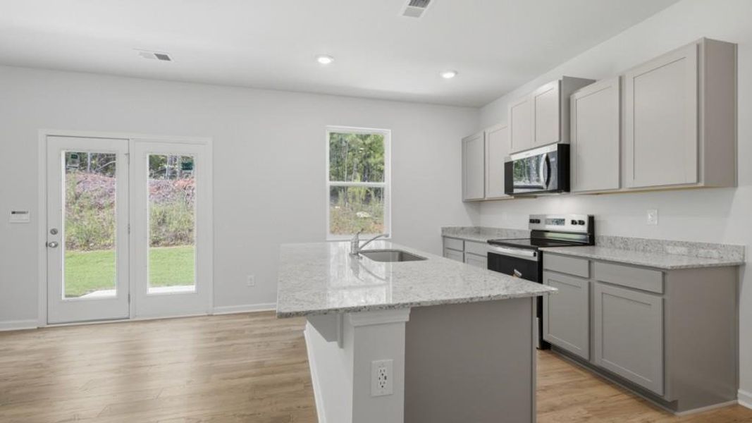 Furnished interior view inside a new home in Oaks at Cedar Grove, Fairburn (Image 7).