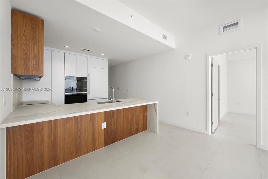 Furnished interior view inside a new home in , Miami (Image 7).