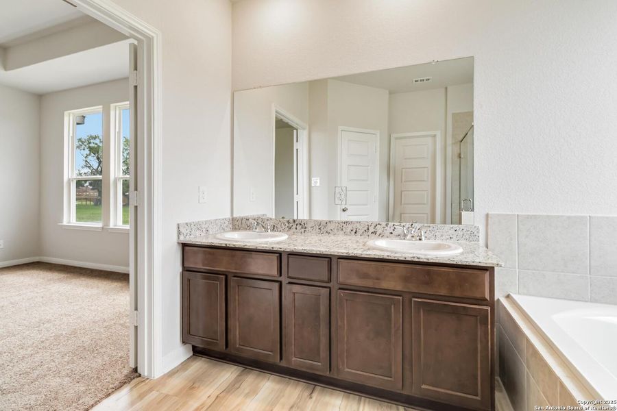 Furnished interior view inside a new home in Lonesome Dove, San Antonio (Image 5). Furnished interior view inside a new home in Lonesome Dove, San Antonio (Image 5).