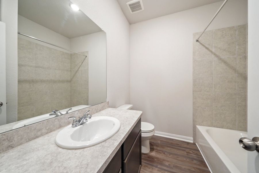 Representative furnished interior of a home built from the Truman by First America Homes in Splendora Fields, Splendora (Image 6).