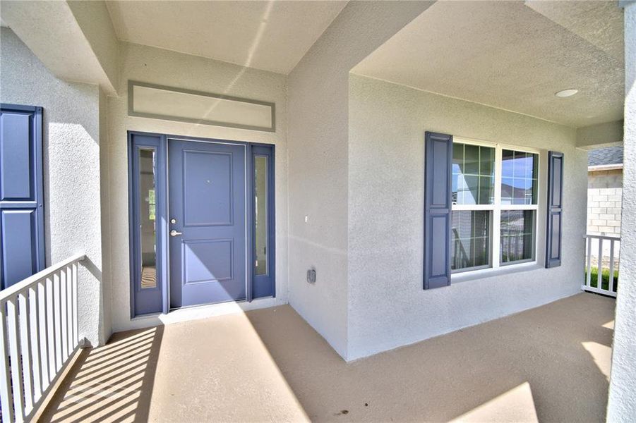 Exterior details and patio area of a home in Cadence Crossing, Auburndale (Image 4).