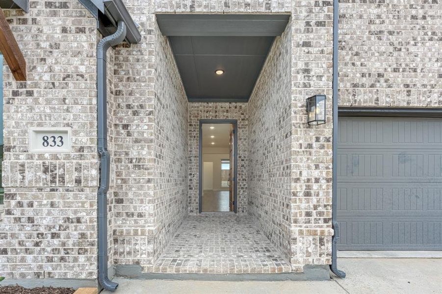 Exterior details and patio area of a home in Wildflower Ranch 60-65, Fort Worth (Image 4). Exterior details and patio area of a home in Wildflower Ranch 60-65, Fort Worth (Image 4).