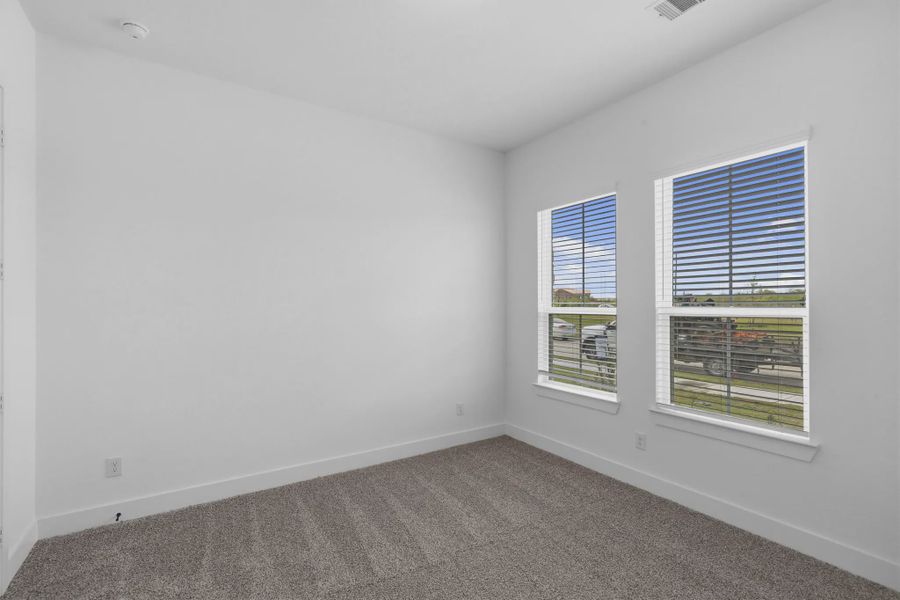 Representative unfurnished interior of a home built from the Sorenstam by Chesmar Homes in Riceland Alley Loads, Mont Belvieu (Image 59).