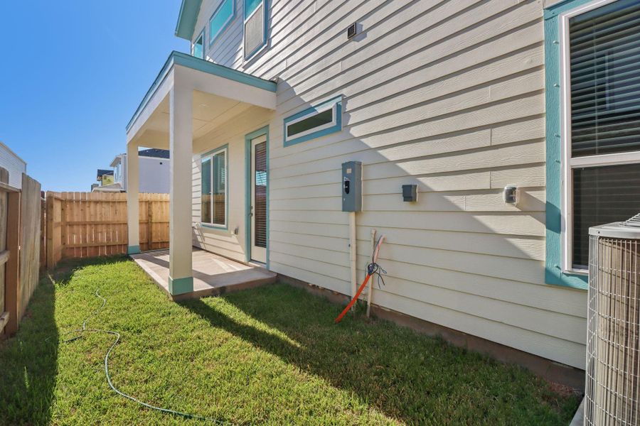 Exterior details and patio area of a home in Kemah Crossing - Luxe Series, Kemah (Image 28).