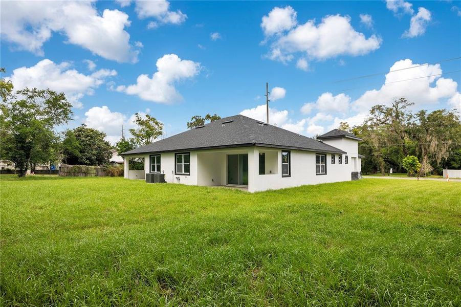 Front exterior of a new home in , Apopka, FL, highlighting curb appeal (Image 26).