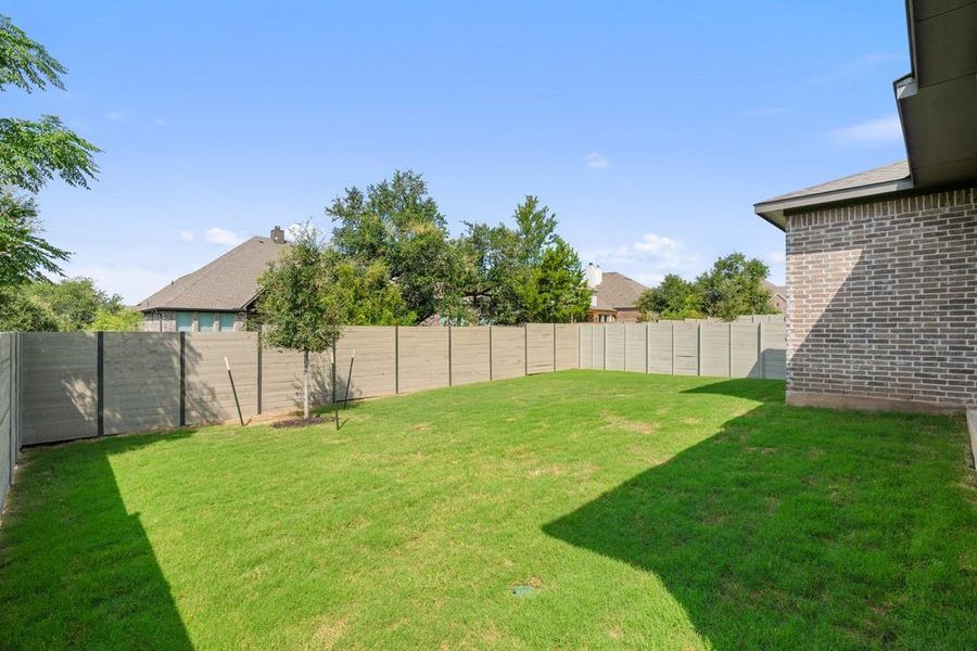 Exterior details and patio area of a home in Wolf Ranch, Georgetown (Image 21). Exterior details and patio area of a home in Wolf Ranch, Georgetown (Image 21).