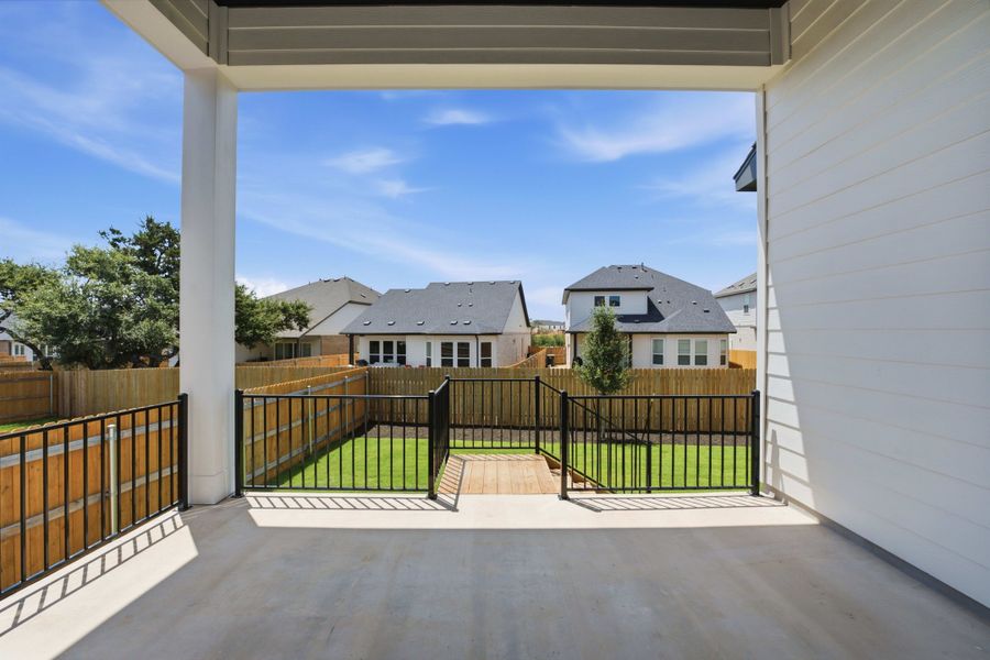 Exterior details and patio area of a home in Heritage, Dripping Springs (Image 4).