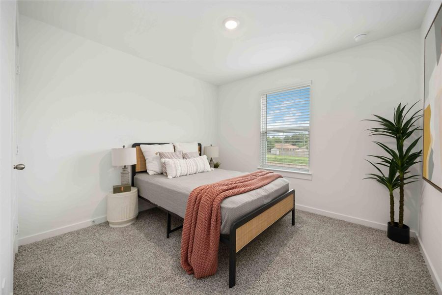 Furnished interior view inside a new home in Grand West, Houston (Image 4).