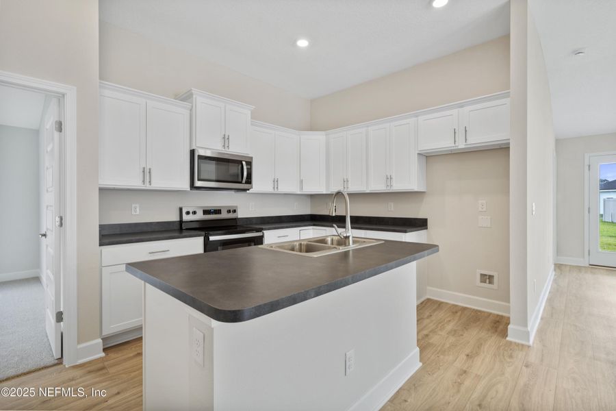 Furnished interior view inside a new home in Summerglen, Jacksonville (Image 6). Furnished interior view inside a new home in Summerglen, Jacksonville (Image 6).