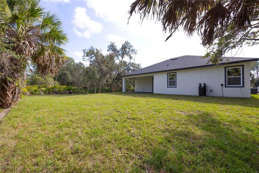 Exterior details and patio area of a home in , Port Charlotte (Image 4).