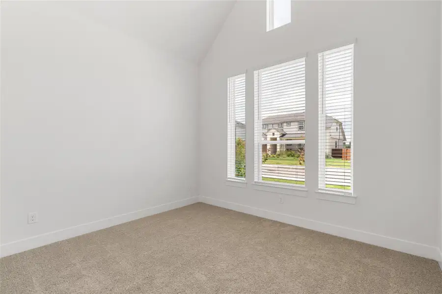 A quiet space with vaulted ceilings and ample natural lighting through large windows. A quiet space with vaulted ceilings and ample natural lighting through large windows.