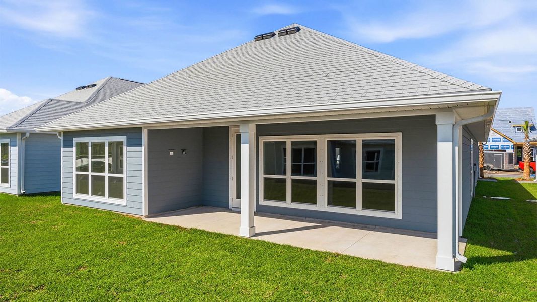 Exterior details and patio area of a home in WindMark Beach, Port Saint Joe (Image 4).
