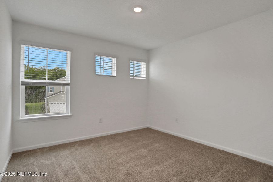 Spacious, unfurnished interior of a new home in TrailMark, St. Augustine (Image 18).