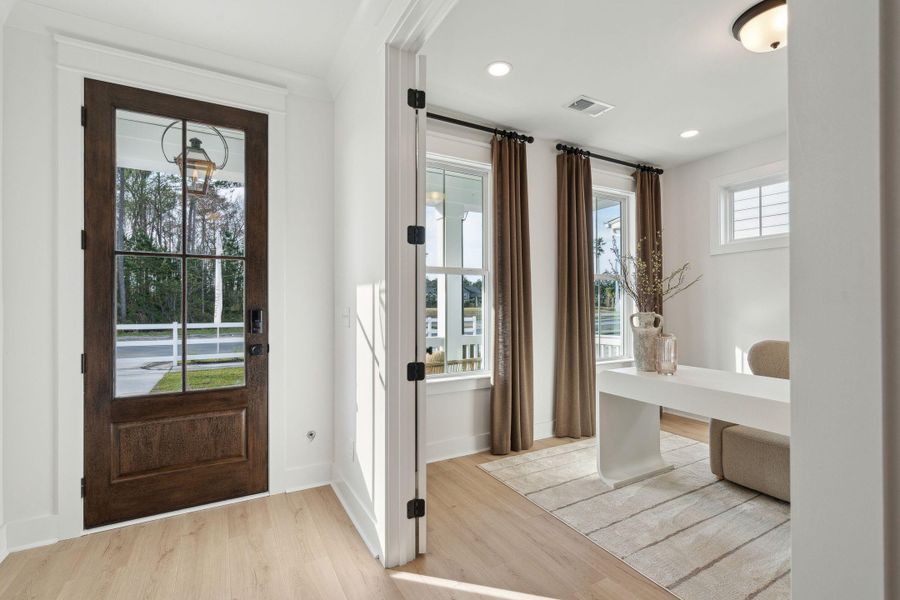 Furnished interior view inside a new home in Tidewater at Lakes of Cane Bay, Summerville (Image 12). Furnished interior view inside a new home in Tidewater at Lakes of Cane Bay, Summerville (Image 12).