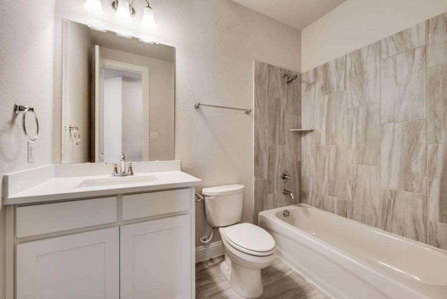 Representative furnished interior of a home built from the Brandonwood by Grand Homes in Edgewater, Fate (Image 10).