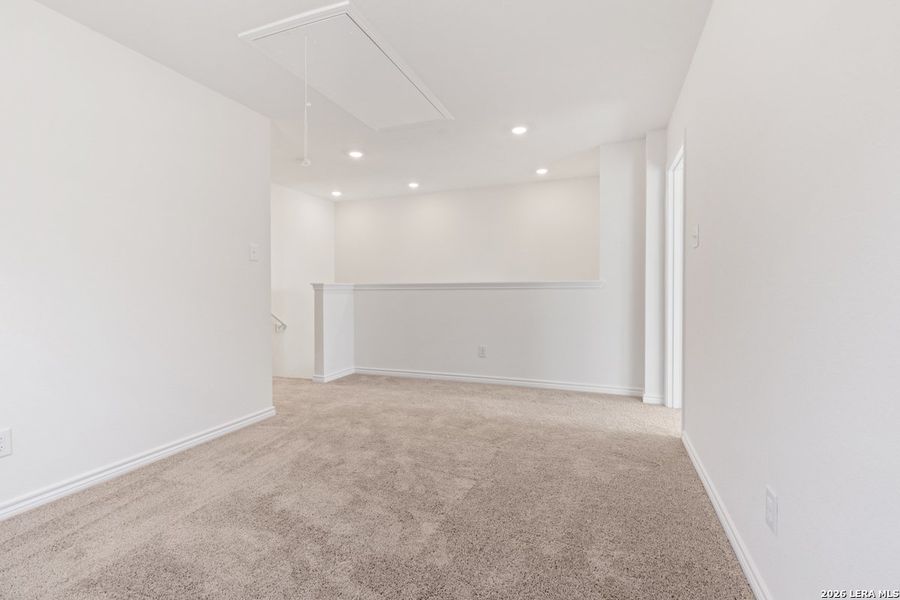 Spacious, unfurnished interior of a new home in Preserve at Culebra - Villa Collection, San Antonio (Image 16). Spacious, unfurnished interior of a new home in Preserve at Culebra - Villa Collection, San Antonio (Image 16).