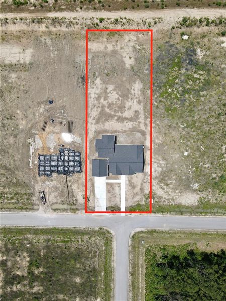 Front exterior of a new home in , Dayton, TX, highlighting curb appeal (Image 25).