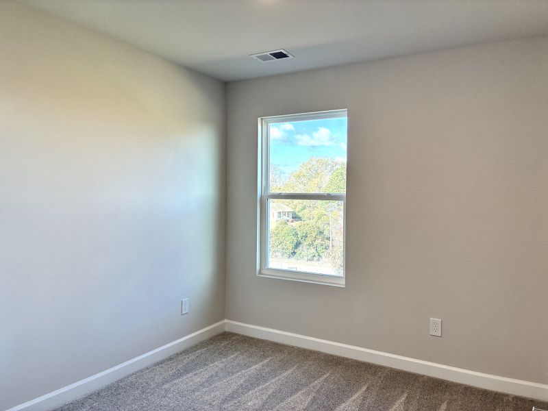 Spacious, unfurnished interior of a new home in Holly View, Greenville (Image 19).