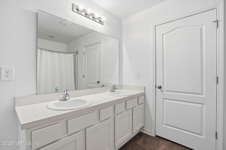 Furnished interior view inside a new home in Cross Creek Express, Green Cove Springs (Image 14).