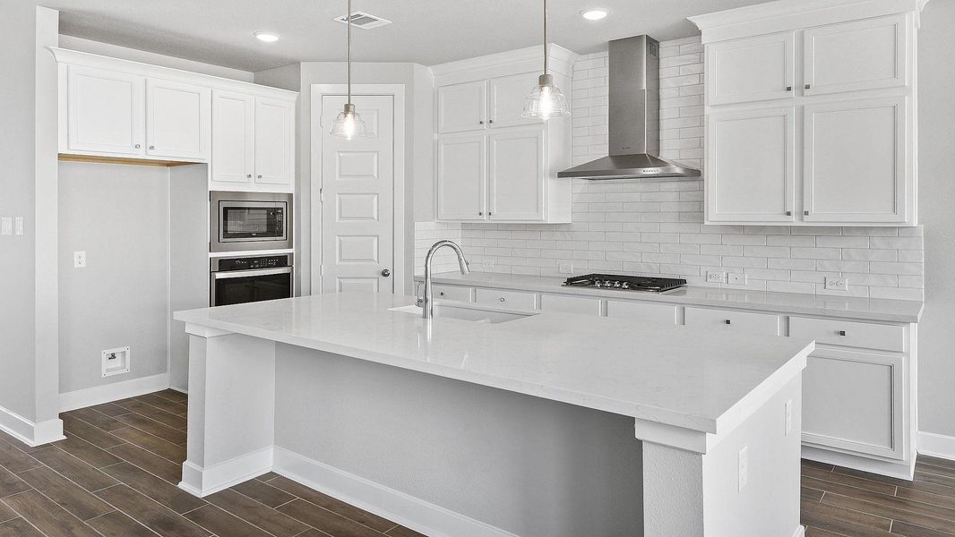 Furnished interior view inside a new home in Sunterra, Katy (Image 8).