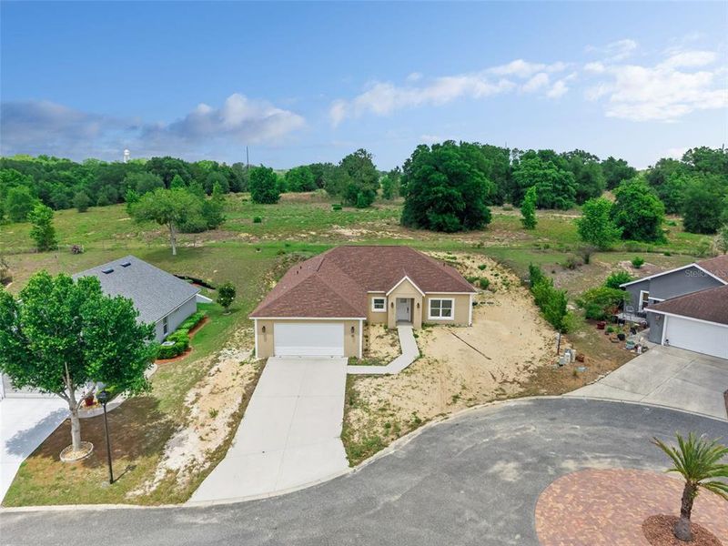 Front exterior of a new home in , Umatilla, FL, highlighting curb appeal (Image 5).