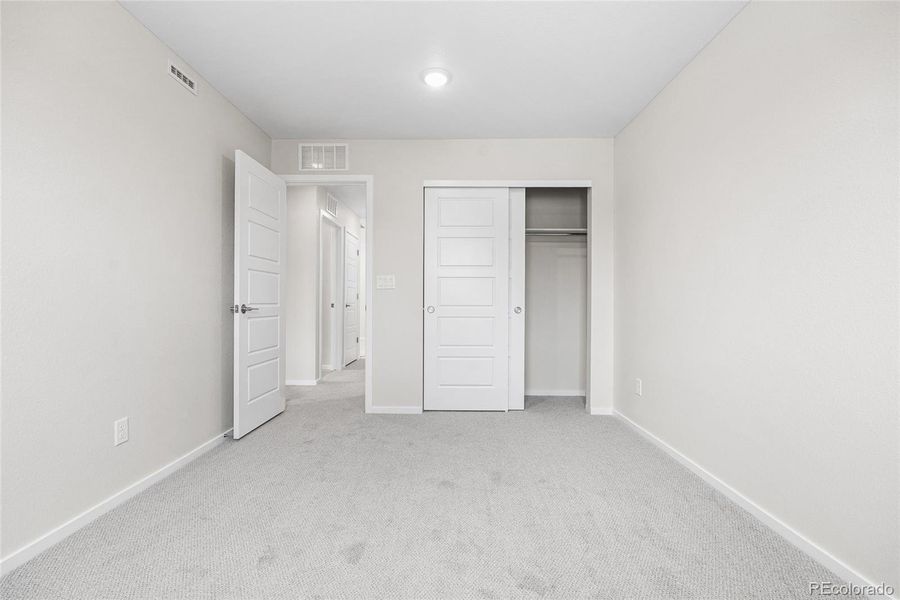 Spacious, unfurnished interior of a new home in Barefoot Village, Firestone (Image 30).