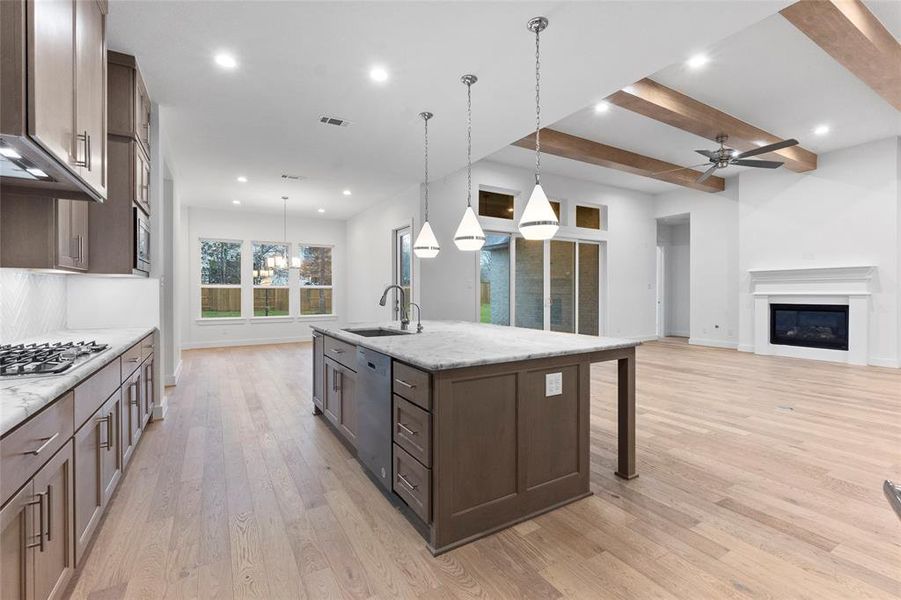 Double Waste Pull-out and Space for Stools at the Kitchen Island