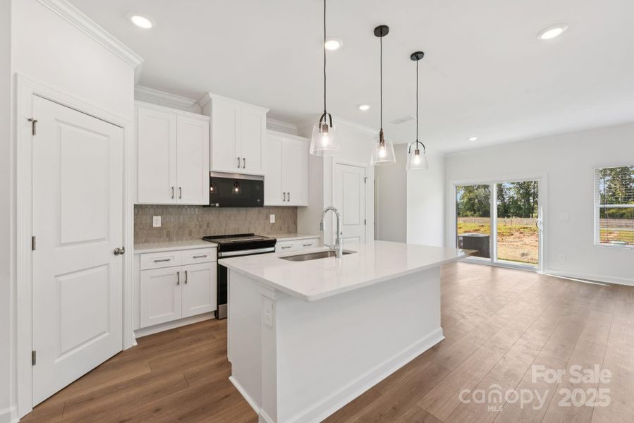 Photo is not of the actual home, but is an inspirational photo of builder’s model home and may depict options, furnishings, and/or decorator features that are not included.