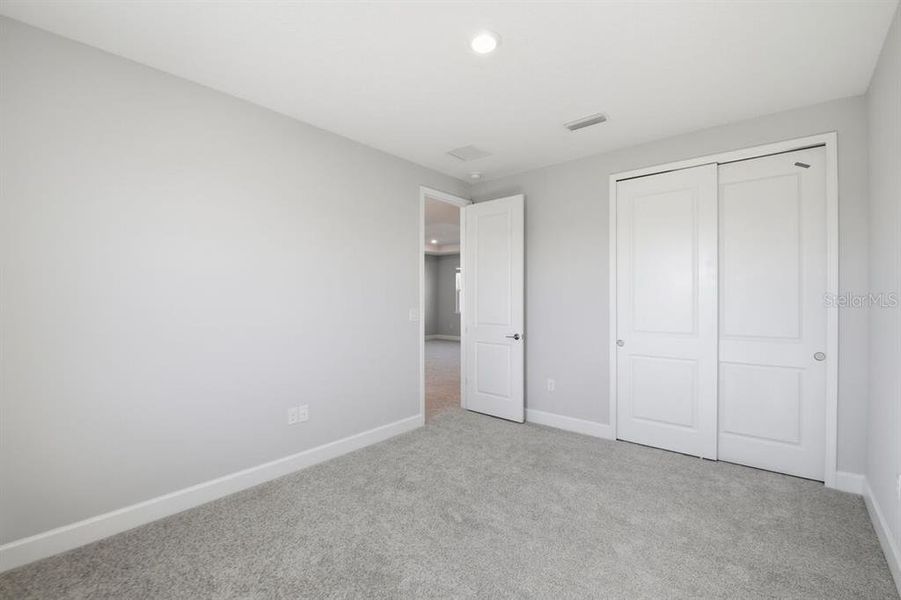 Spacious, unfurnished interior of a new home in Harvest at Ovation, Winter Garden (Image 22).