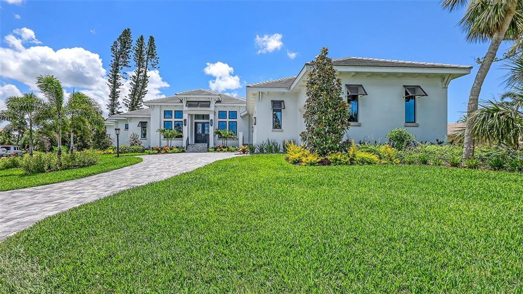 Exterior details and patio area of a home in , Longboat Key (Image 38).