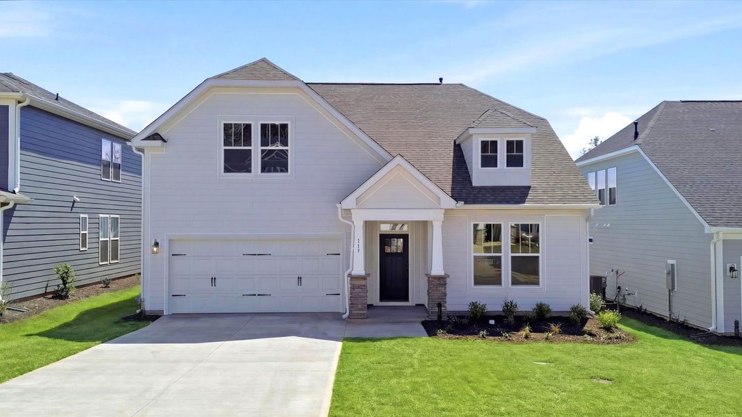 Front exterior of a new home in Mulberry Estates, Simpsonville, SC, highlighting curb appeal (Image 20).