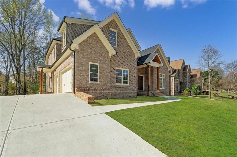 Front exterior of a new home in , Douglasville, GA, highlighting curb appeal (Image 26).