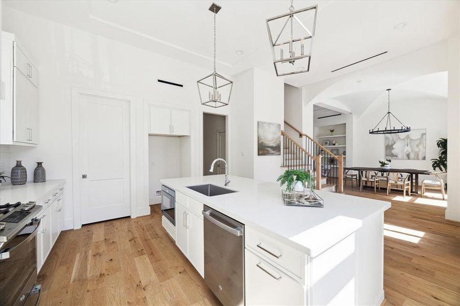 Heart of the Home - This efficient and elegant, purposefully designed kitchen. It offers a range of spaces for both, everyday casual dining and masterful, entertaining. The open plan connects the kitchen and dining.