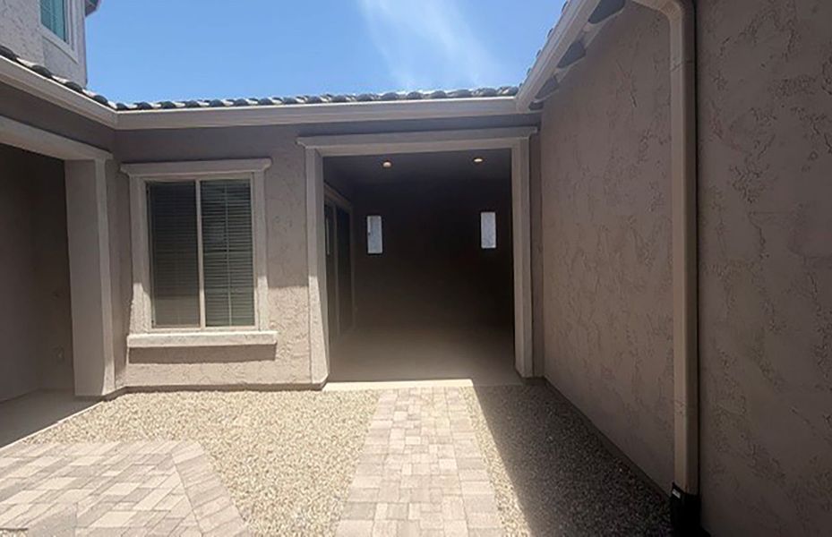 Exterior details and patio area of a home in Harvest - Enchantment Series, Queen Creek (Image 4). Exterior details and patio area of a home in Harvest - Enchantment Series, Queen Creek (Image 4).