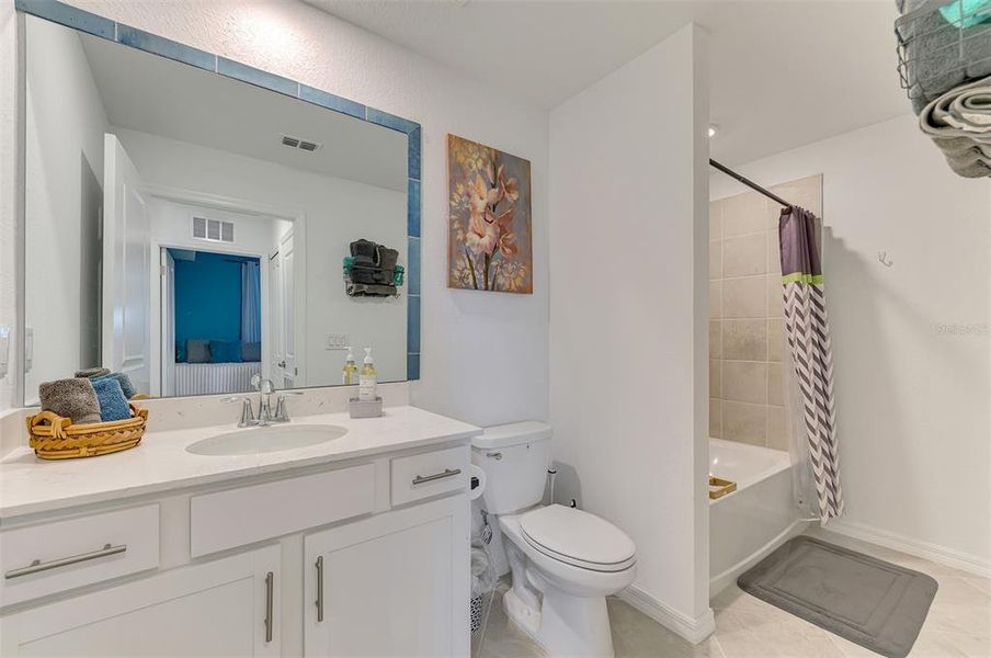 Furnished interior view inside a new home in Wellen Park Golf & Country Club, Venice (Image 32).