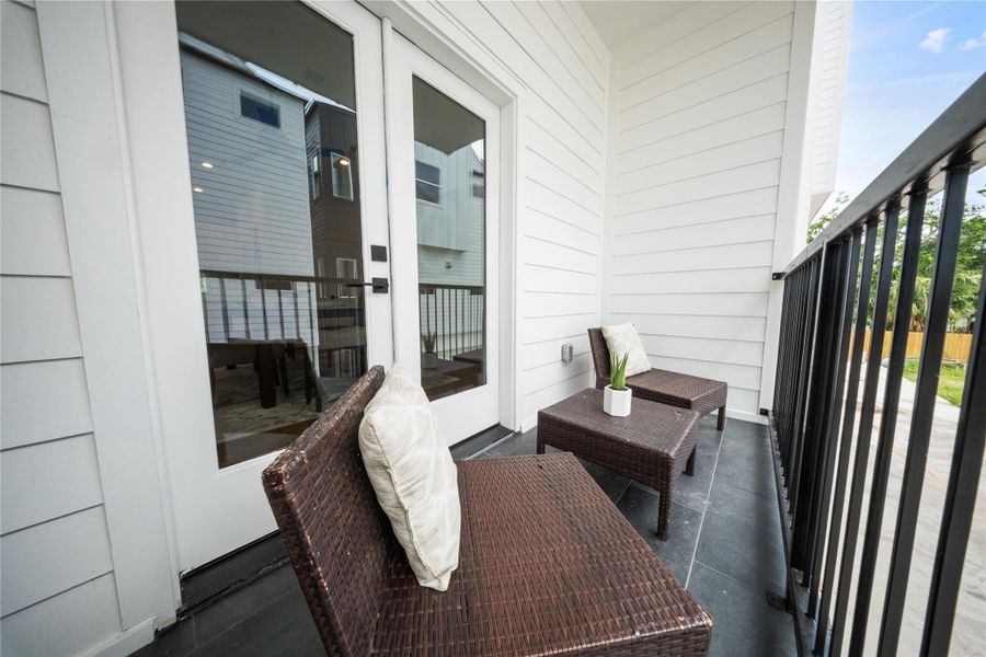 Exterior details and patio area of a home in , Houston (Image 3).