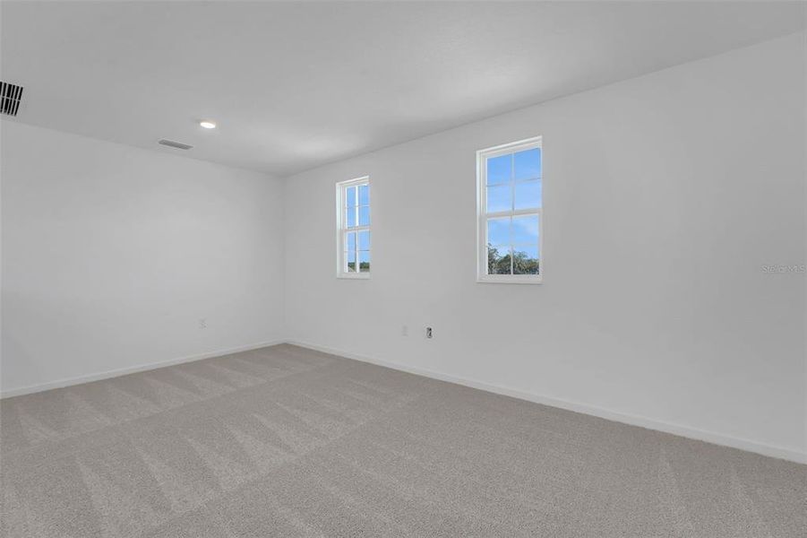 Spacious, unfurnished interior of a new home in Willowbrook North, Winter Haven (Image 32).