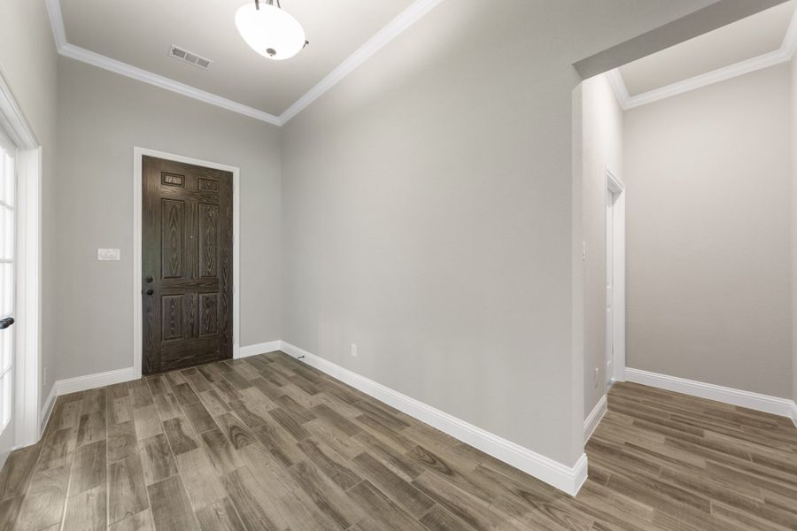 Representative unfurnished interior of a home built from the 2591 by Robbie Hale Homes in High Meadows Estates, Nevada (Image 27).