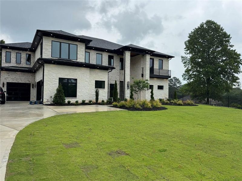 Front exterior of a new home in , Buford, GA, highlighting curb appeal (Image 19).