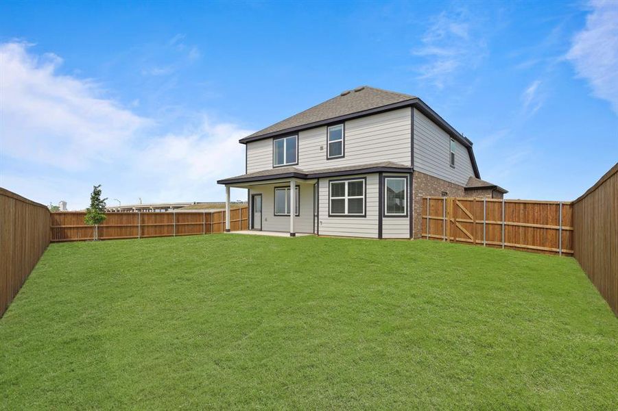 Front exterior of a new home in Burgess Meadows, Cleburne, TX, highlighting curb appeal (Image 15). Front exterior of a new home in Burgess Meadows, Cleburne, TX, highlighting curb appeal (Image 15).