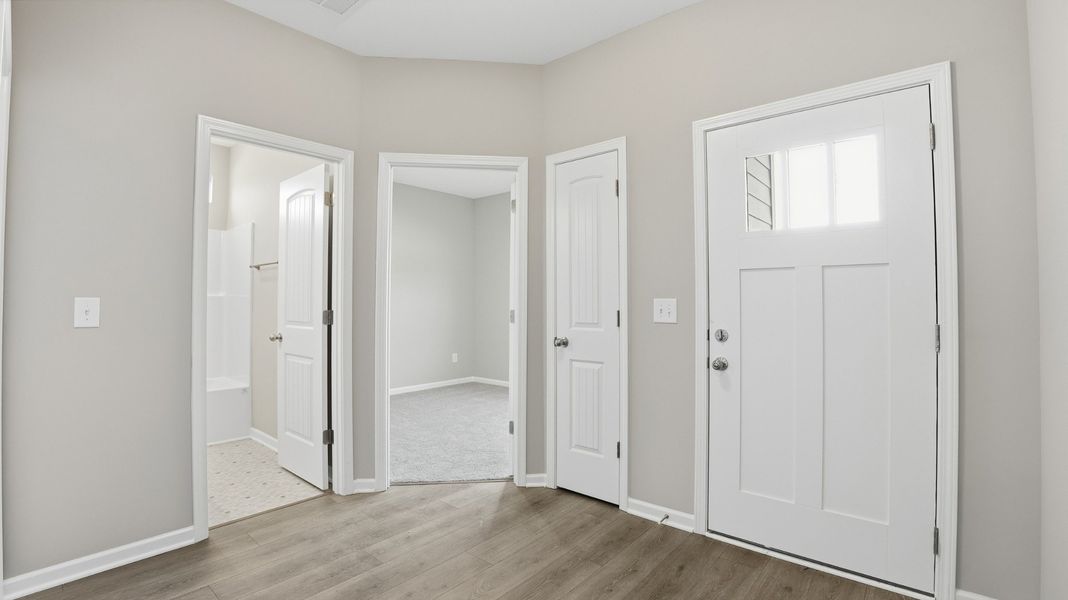 foyer view. There are 2-bedrooms located in the front of the house. 2-bedrooms in the back of the house.