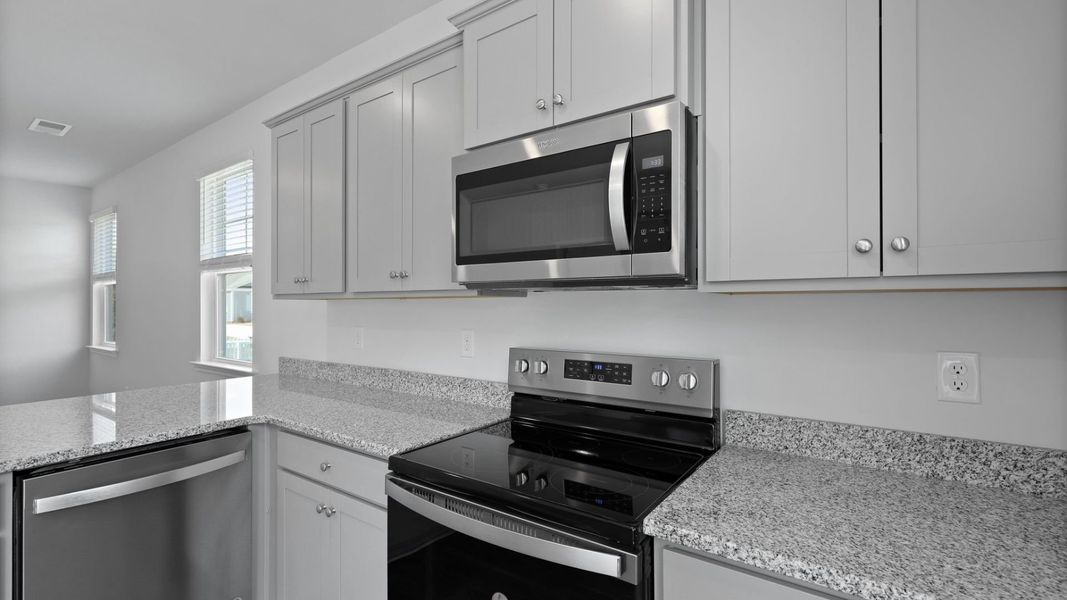 Representative furnished interior of a home built from the PERRY by D.R. Horton in North Shore, Summerton (Image 8).
