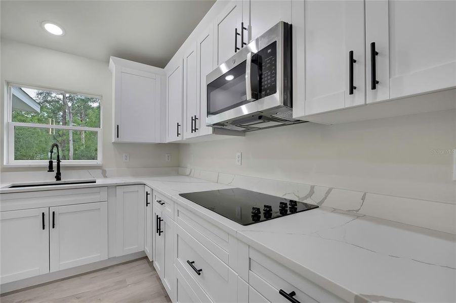 Furnished interior view inside a new home in , Dunnellon (Image 7).