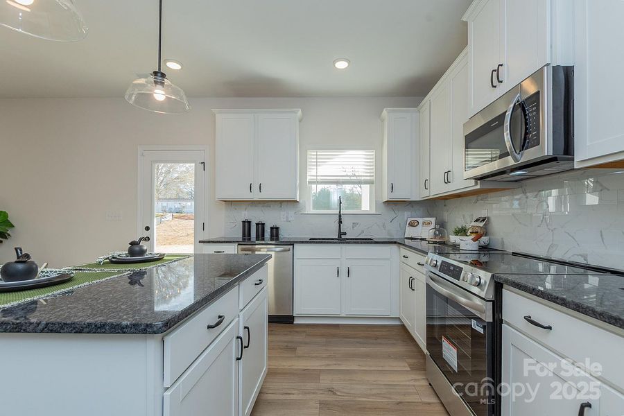 Furnished interior view inside a new home in Green Acres, Concord (Image 14).