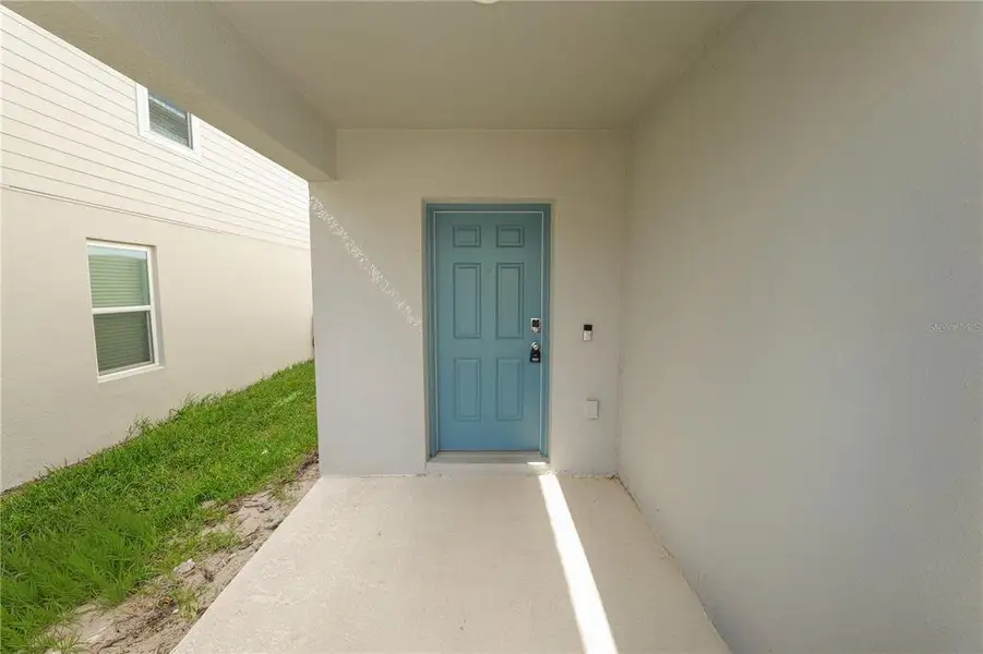 Exterior details and patio area of a home in Marion Creek, Haines City (Image 3). Exterior details and patio area of a home in Marion Creek, Haines City (Image 3).
