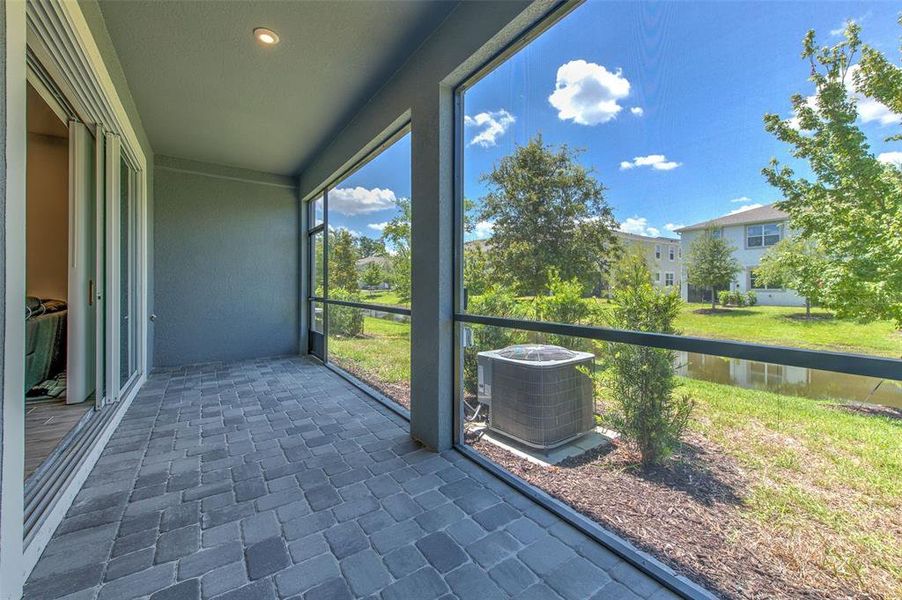 Exterior details and patio area of a home in Bloomingdale Townes, Brandon (Image 27).