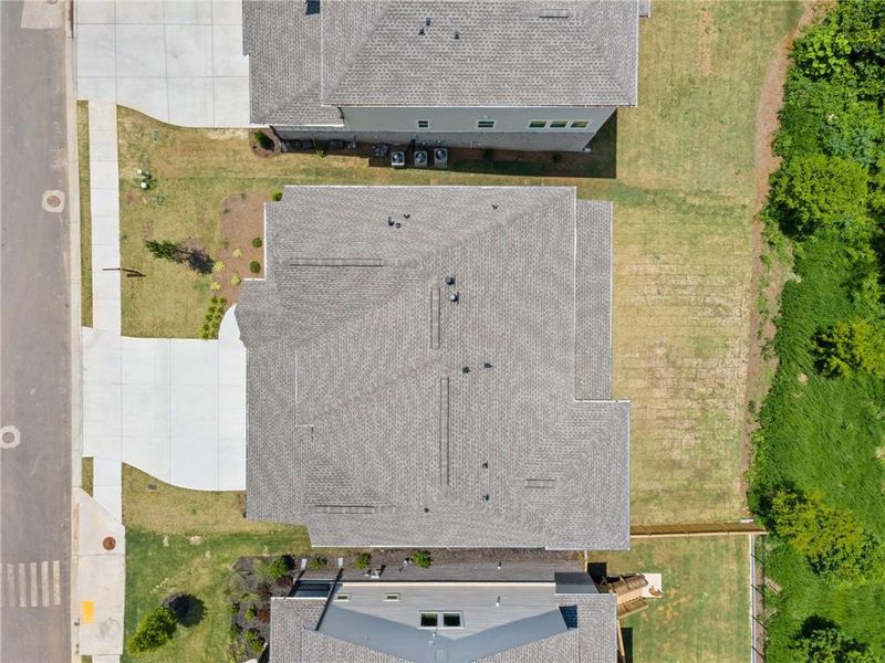 Front exterior of a new home in , Woodstock, GA, highlighting curb appeal (Image 1). Front exterior of a new home in , Woodstock, GA, highlighting curb appeal (Image 1).