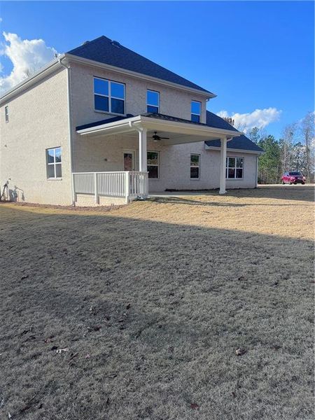 Exterior details and patio area of a home in Mirror Lake at South Harbour, Villa Rica (Image 18).