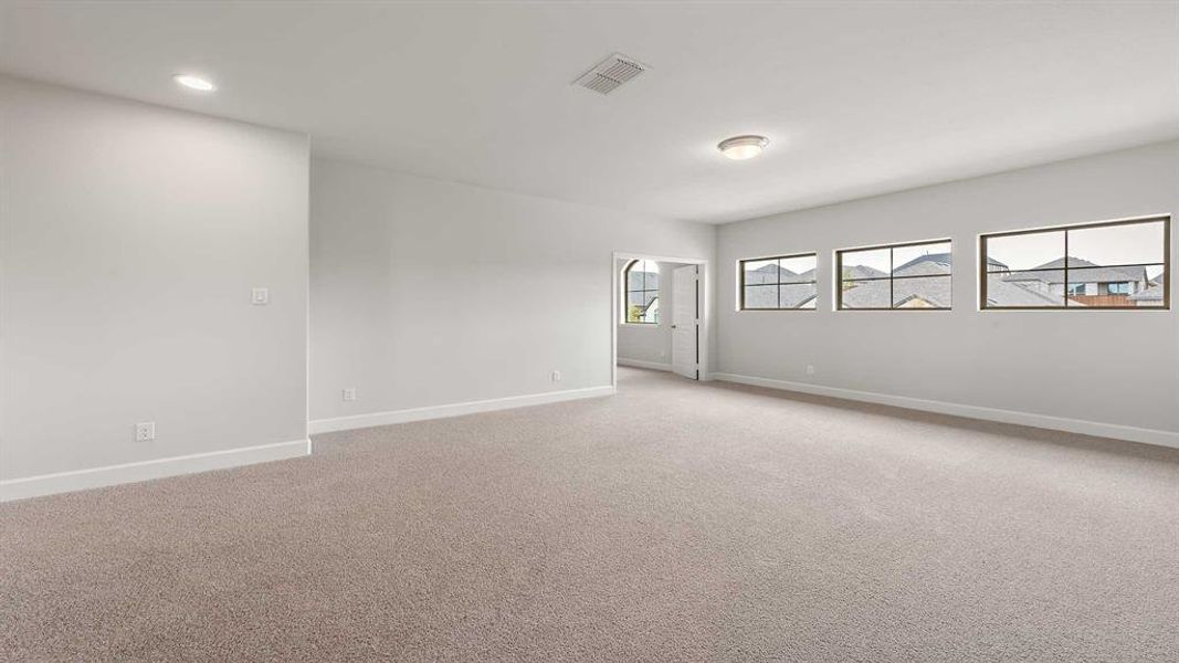 Empty room with carpet floors