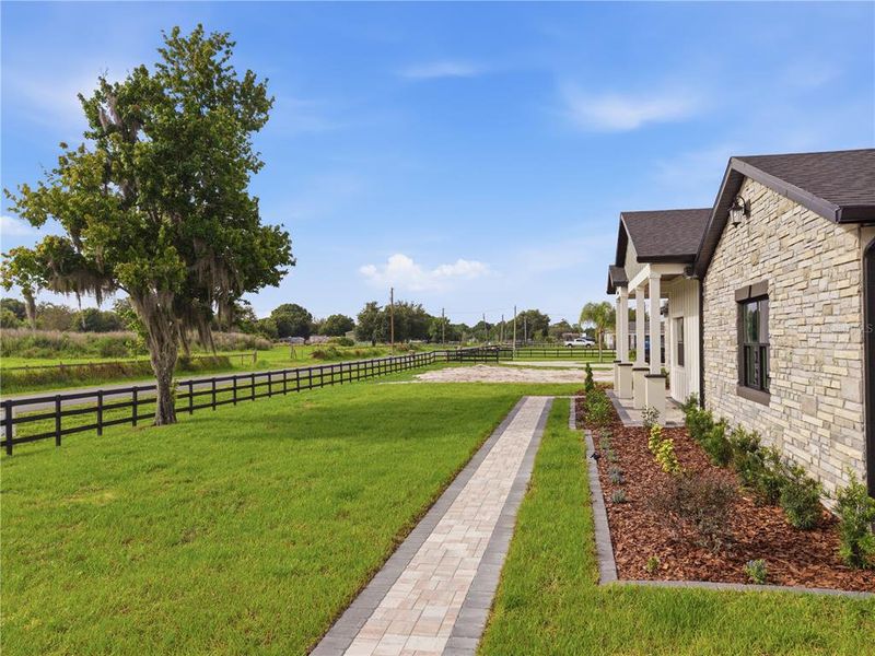 Front exterior of a new home in , St. Cloud, FL, highlighting curb appeal (Image 32).